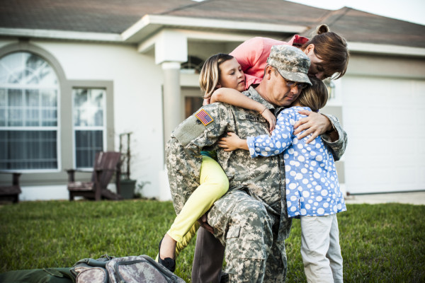family-hugging-soldier-before-deployment-1